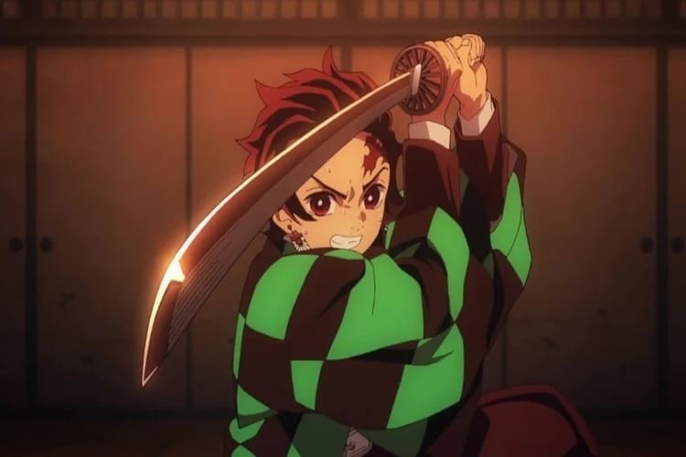 Imagem do Tanjiro usando a sua Katana Nichirin